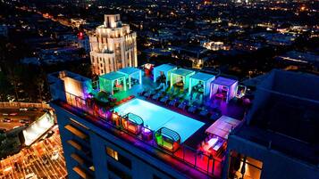 Outdoor pool, free cabanas, pool umbrellas