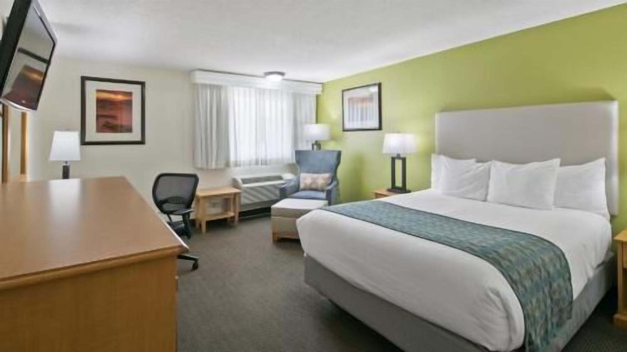 In-room safe, desk, laptop workspace, blackout curtains