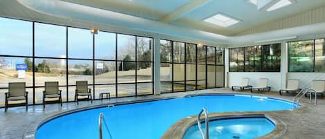 Indoor pool, open 8:00 AM to 10:00 PM, pool loungers