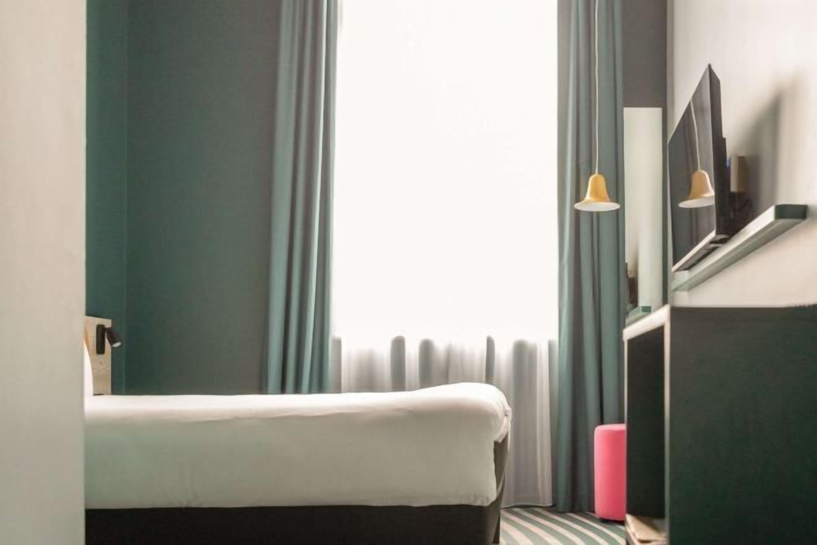 Blackout drapes, soundproofing, iron/ironing board, free WiFi