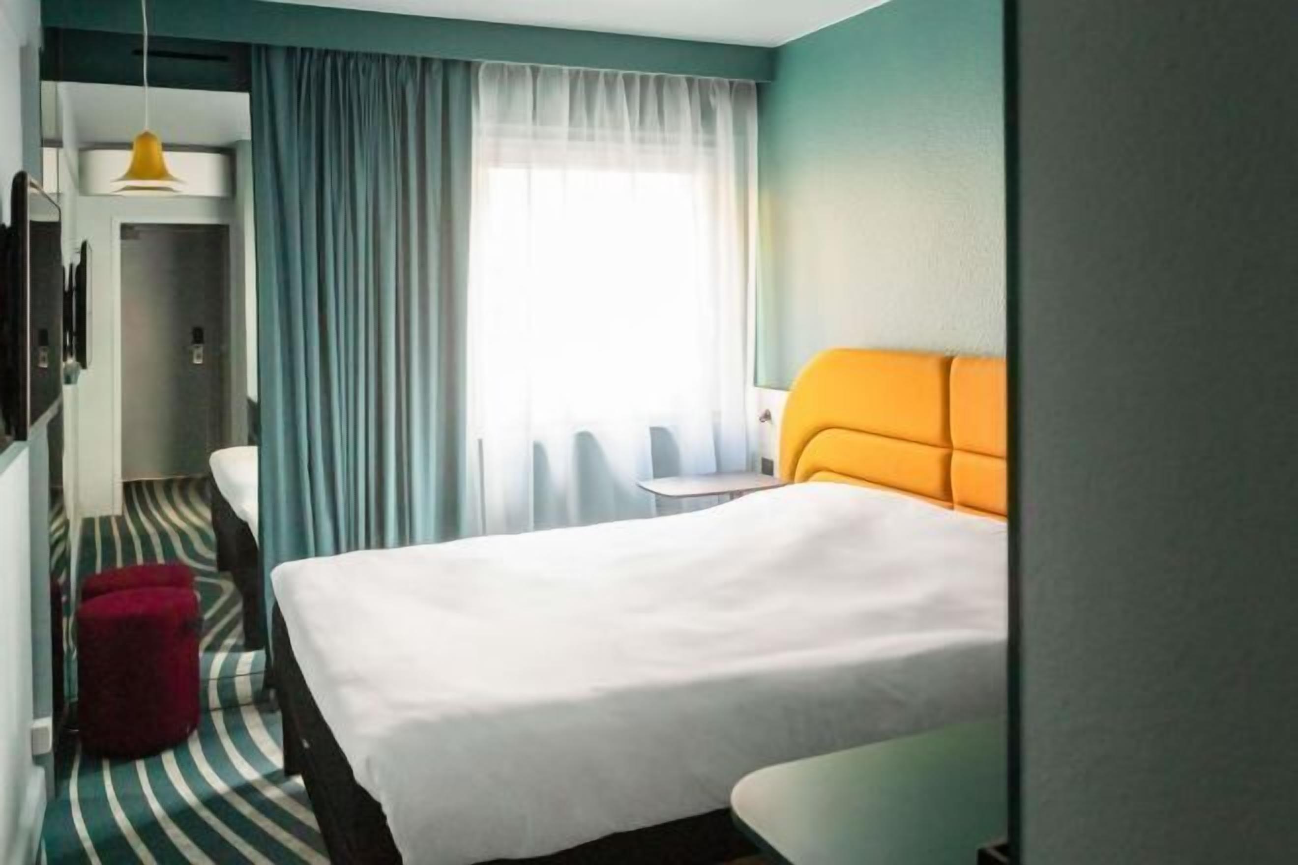 Blackout drapes, soundproofing, iron/ironing board, free WiFi