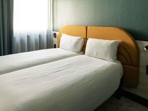 Blackout drapes, soundproofing, iron/ironing board, free WiFi