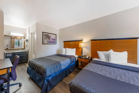 Standard Double Room, 2 Double Beds, Non Smoking | Iron/ironing board, free WiFi, bed sheets. Rodeway Inn at Nevada State Capitol