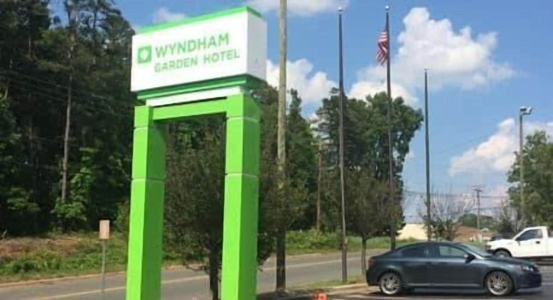 A sign for Wyndham Garden Hotel.