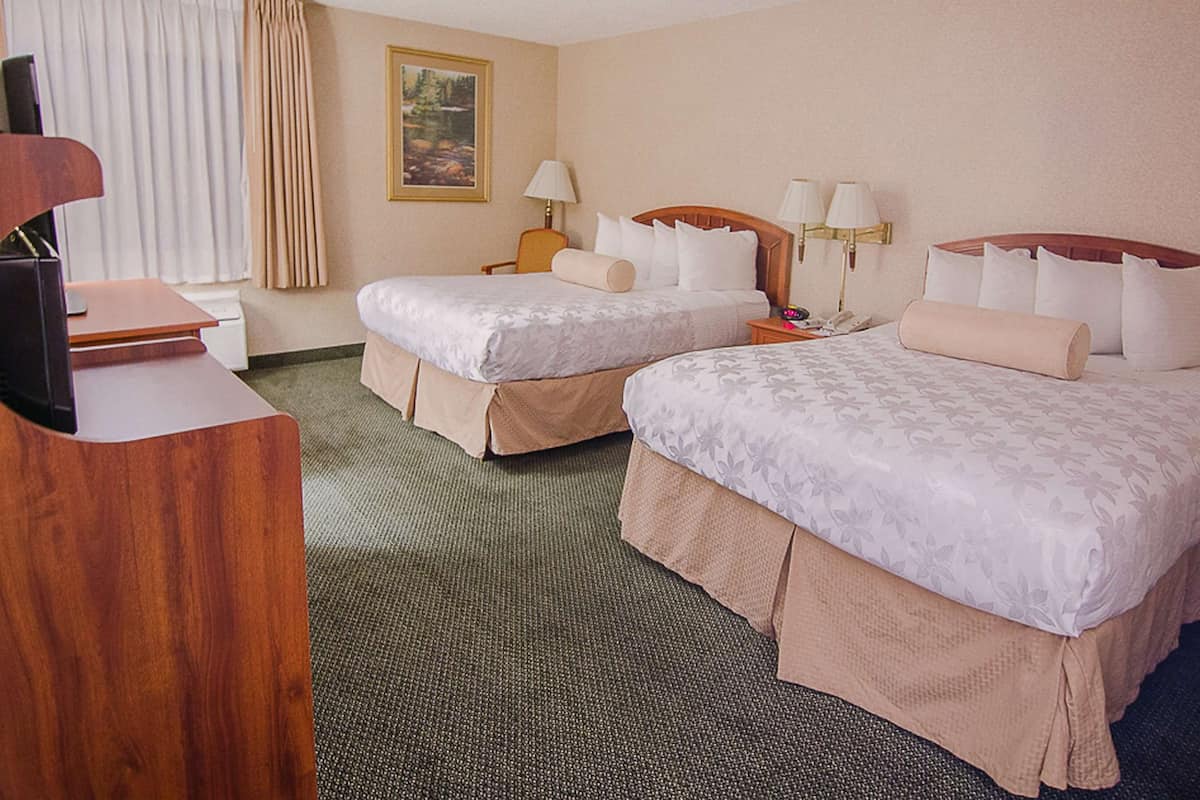 Premium bedding, blackout curtains, iron/ironing board