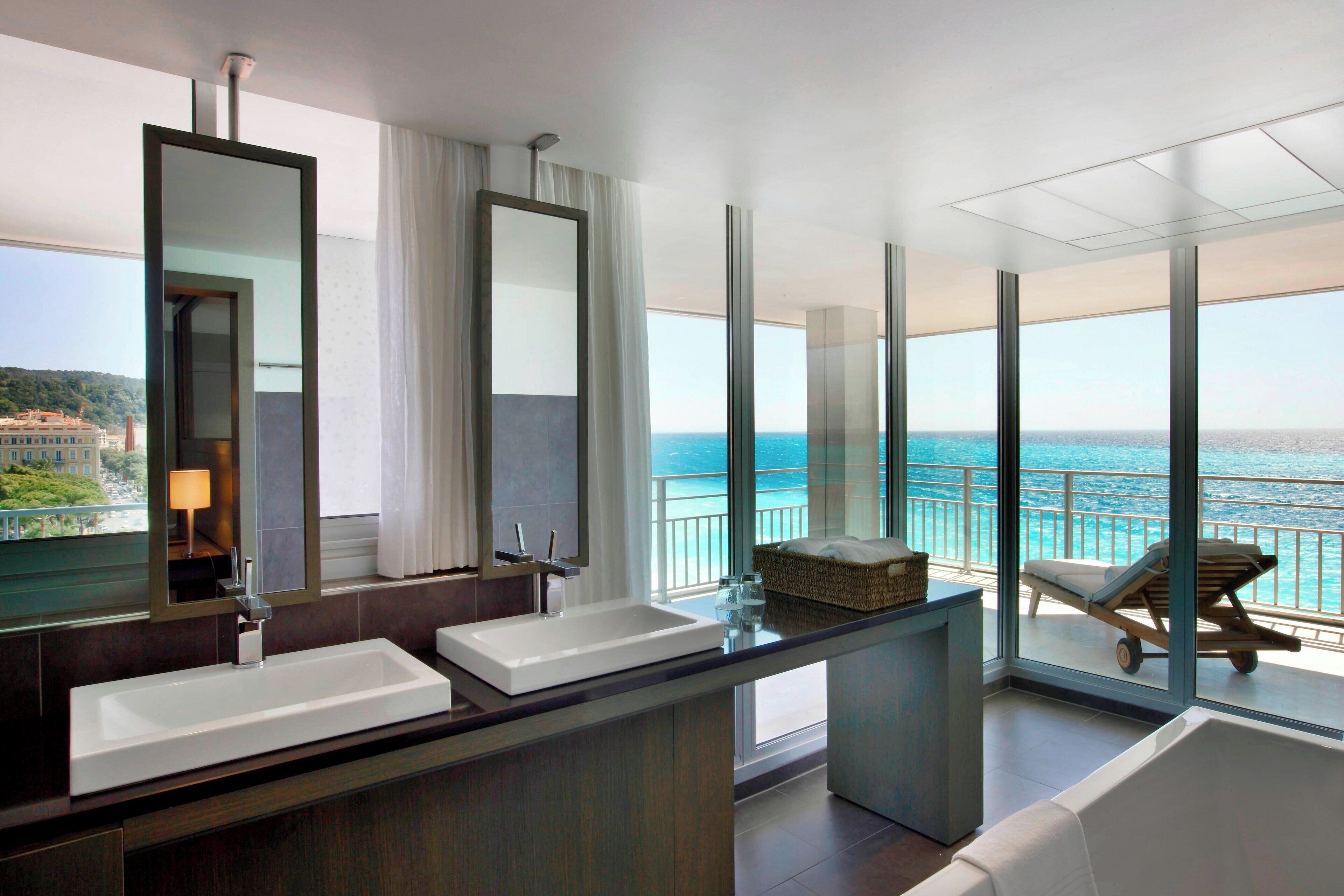 panoramic suite, 1 king bed, non smoking, sea view | bathroom | free toiletries, hair dryer, bathrobes, slippers