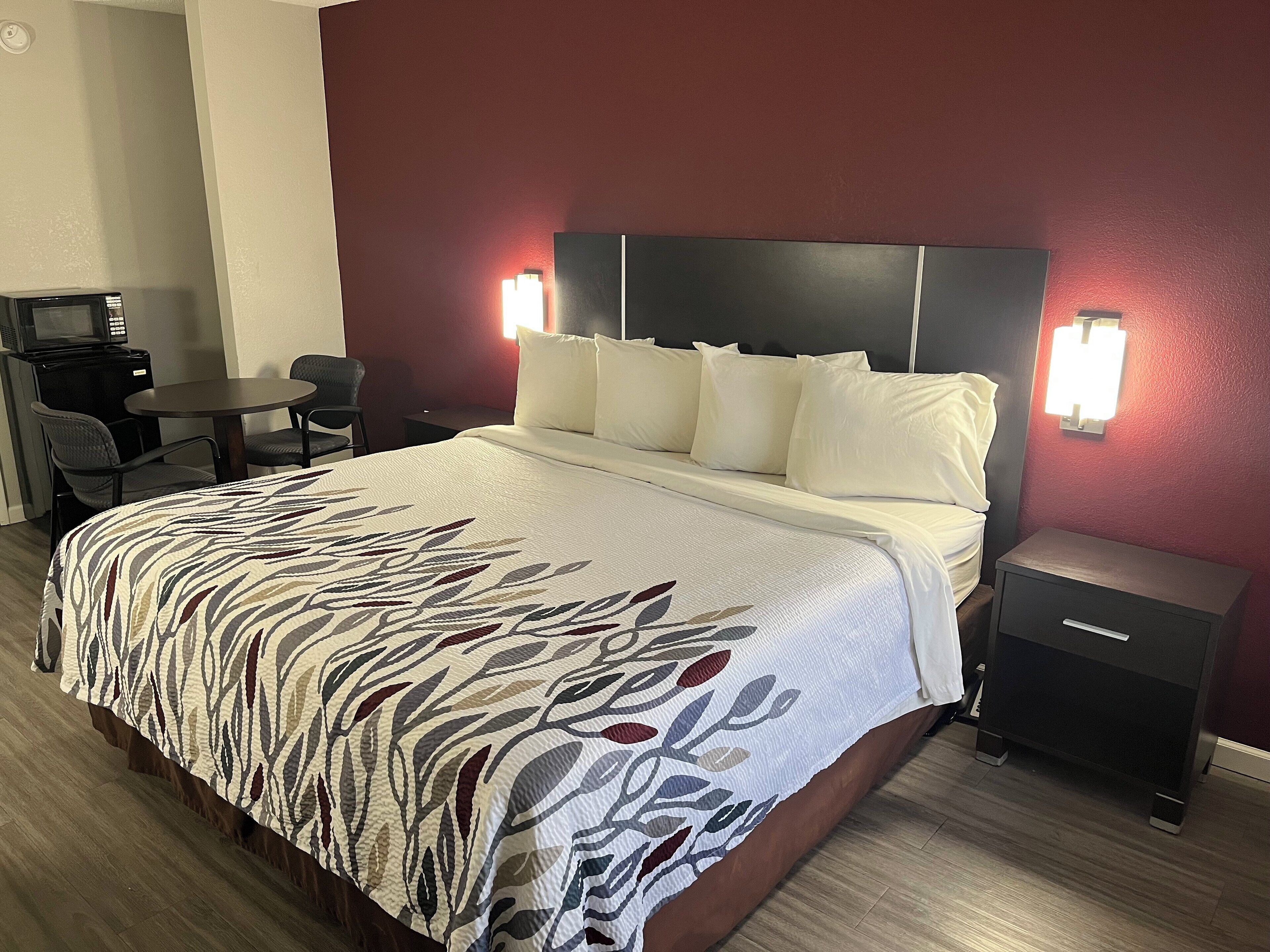 Desk, laptop workspace, blackout curtains, iron/ironing board