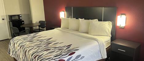 Deluxe Room, 1 King Bed, Roll-in Shower, Non Smoking | Desk, laptop workspace, blackout drapes, iron/ironing board