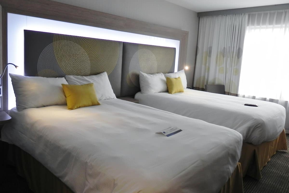 hypo-allergenic bedding, down duvets, in-room safe, desk