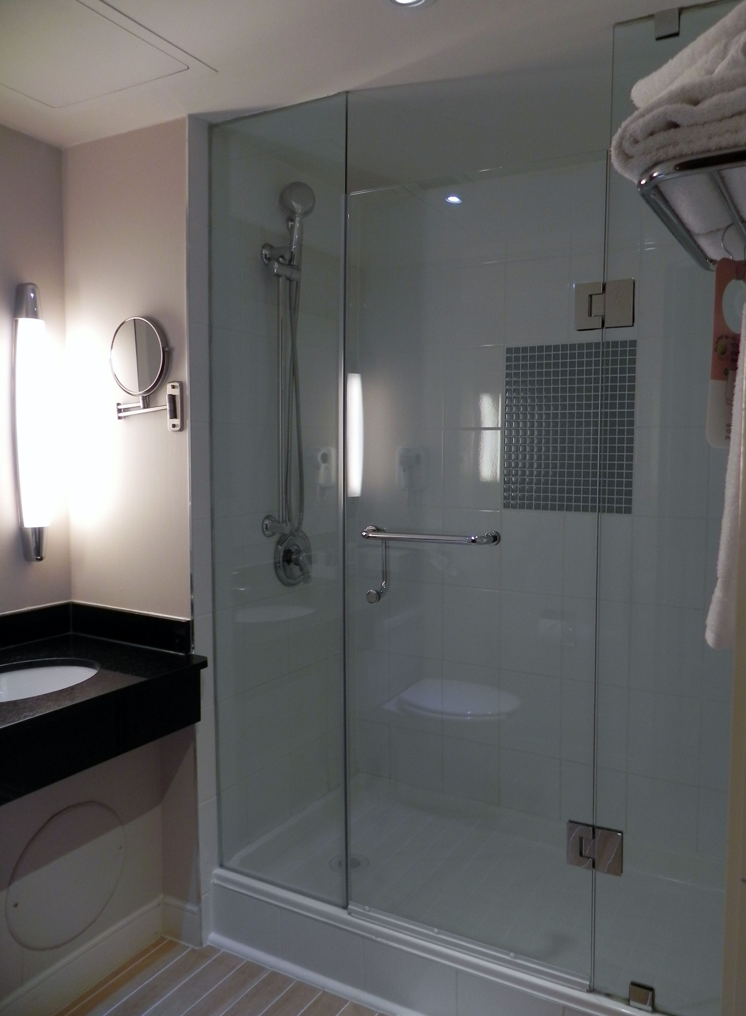 shower, eco-friendly toiletries, hair dryer, towels