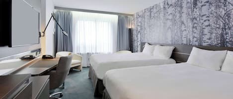 Hypo-allergenic bedding, down duvets, in-room safe, desk