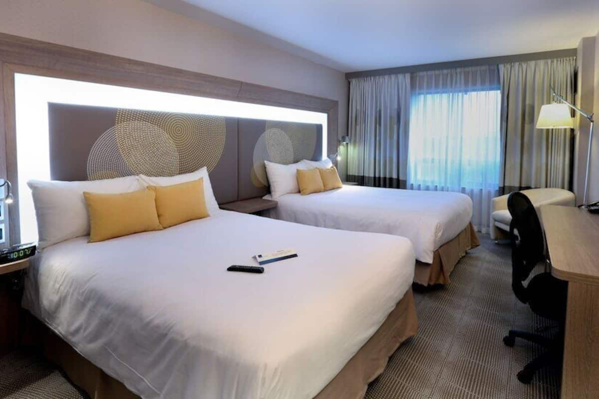 Hypo-allergenic bedding, down comforters, in-room safe, desk