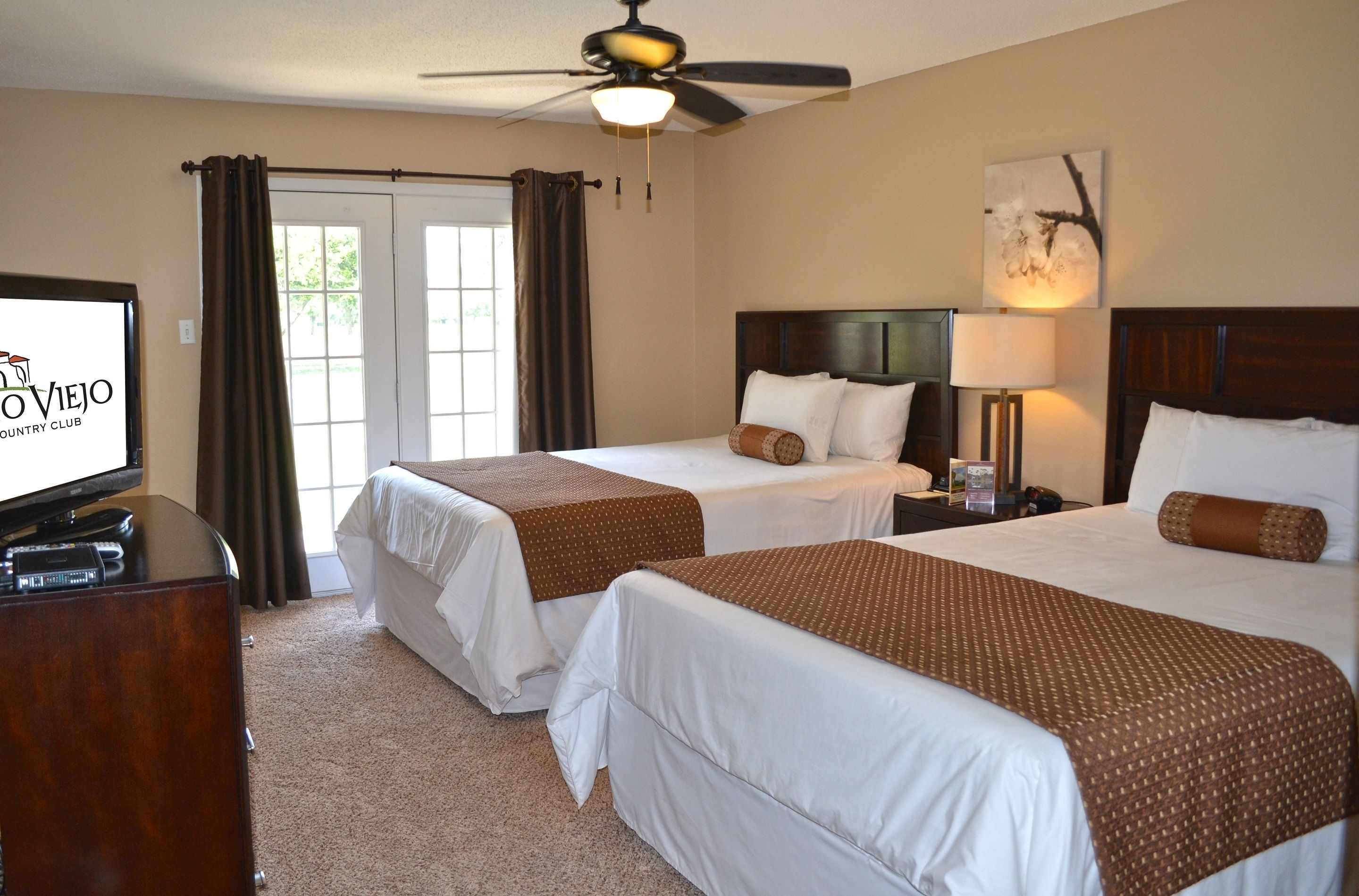 standard room, 2 queen beds | blackout curtains, iron/ironing board, cots/infant beds, rollaway beds