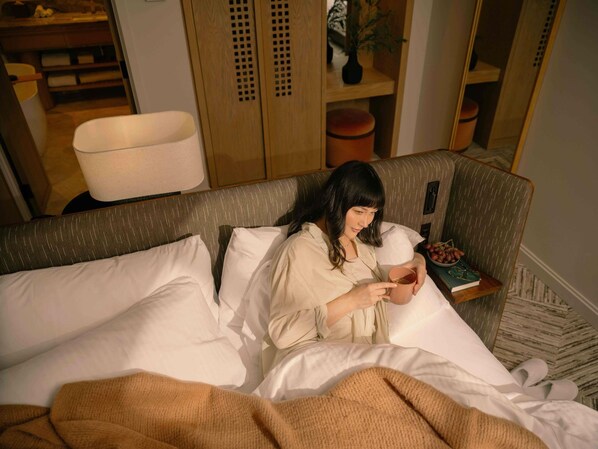 Ropa de cama de alta calidad, colchones con acolchado adicional, minibar