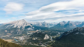 A mountainous landscape with a town nestled in a valley.