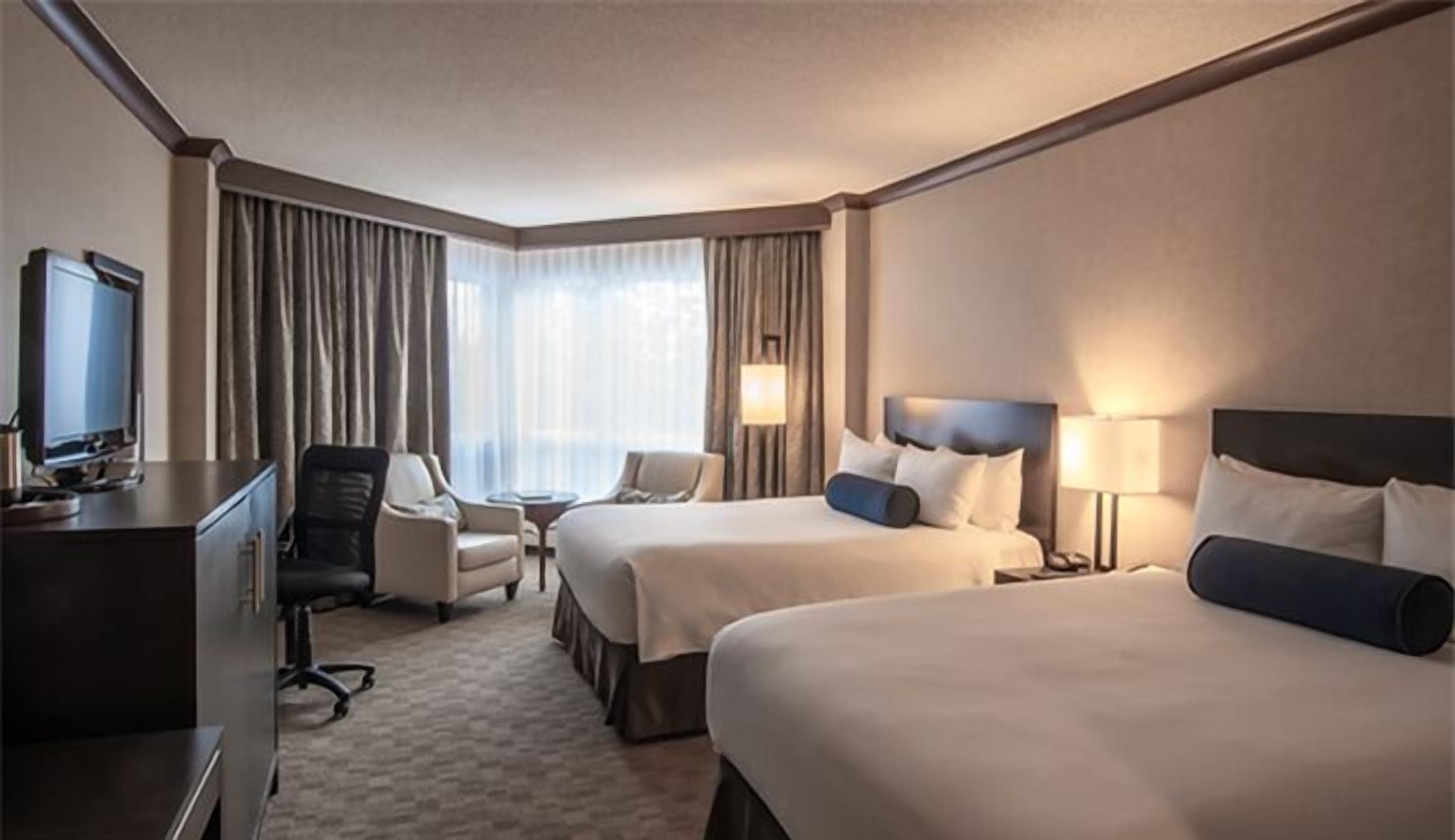 Ropa de cama de alta calidad, colchones con acolchado adicional, minibar