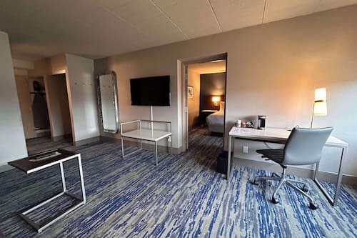 Suite, 1 King Bed, Non Smoking, Refrigerator (Separate Living Room;with Sofabed) | Premium bedding, desk, laptop workspace, blackout curtains