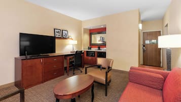 Premium bedding, desk, laptop workspace, iron/ironing board