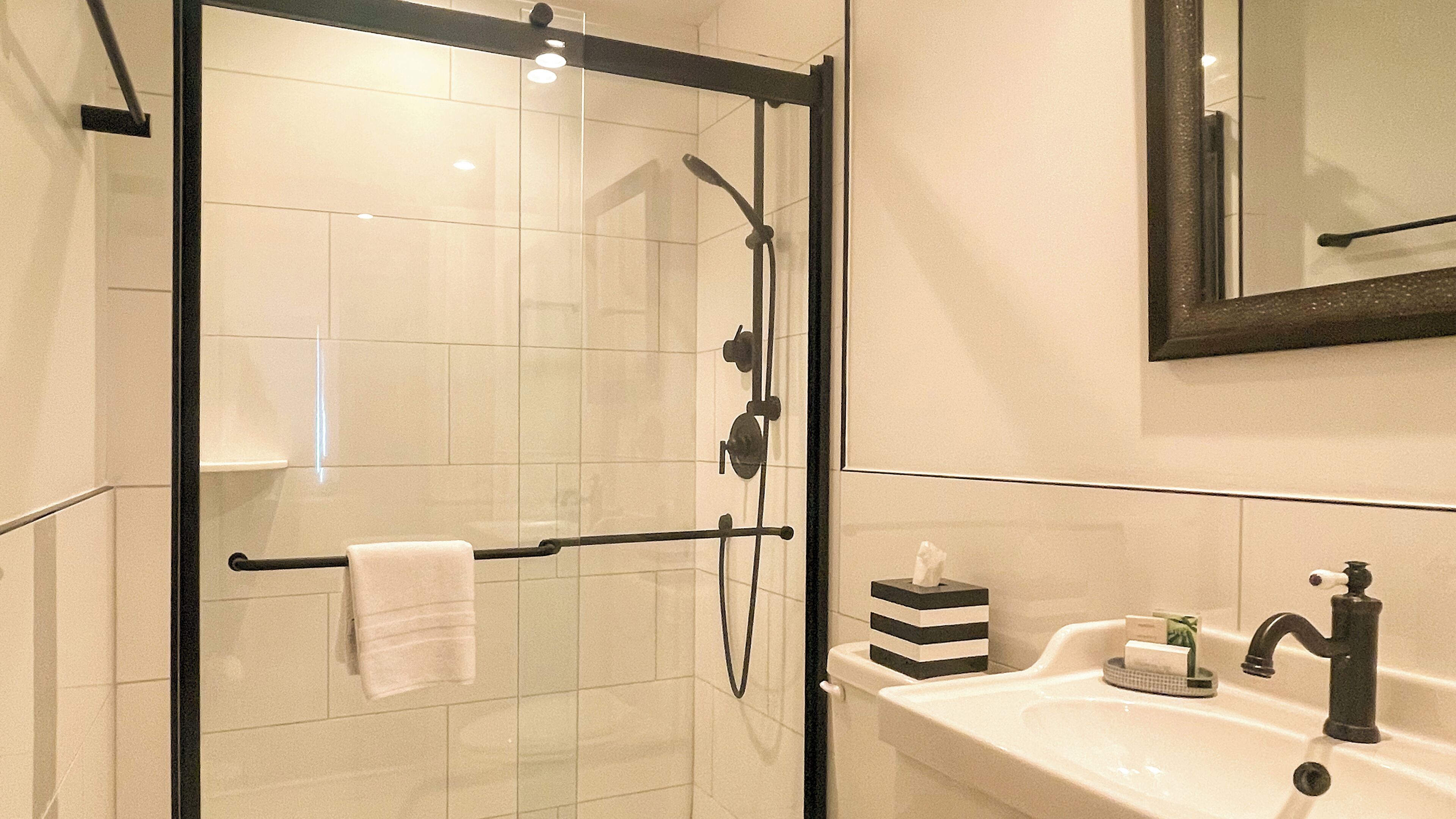 deluxe garden suite | bathroom | designer toiletries, hair dryer, bathrobes, towels