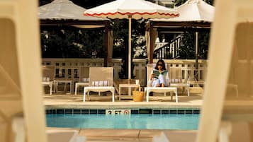Outdoor pool, open 8 AM to 10 PM, cabanas (surcharge), pool umbrellas