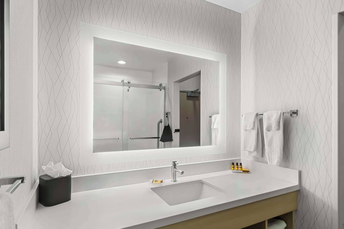 standard room, 1 king bed, non smoking, refrigerator & microwave | bathroom | hair dryer, towels