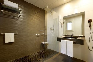 Deep soaking tub, eco-friendly toiletries, hair dryer, towels