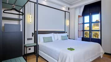 Deluxe Room, Balcony, City View (Puerta Elvira) | Minibar, in-room safe, soundproofing, iron/ironing board