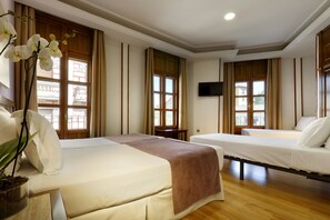 Family Room | Minibar, in-room safe, soundproofing, iron/ironing board