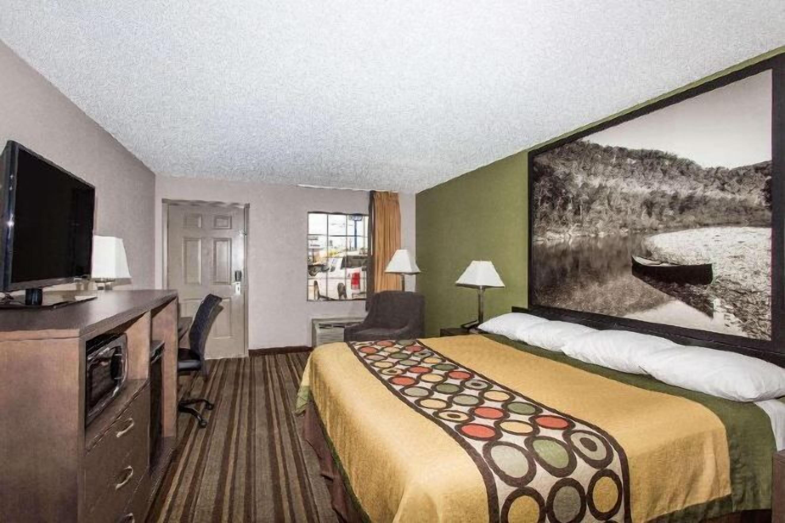 Desk, laptop workspace, blackout curtains, iron/ironing board