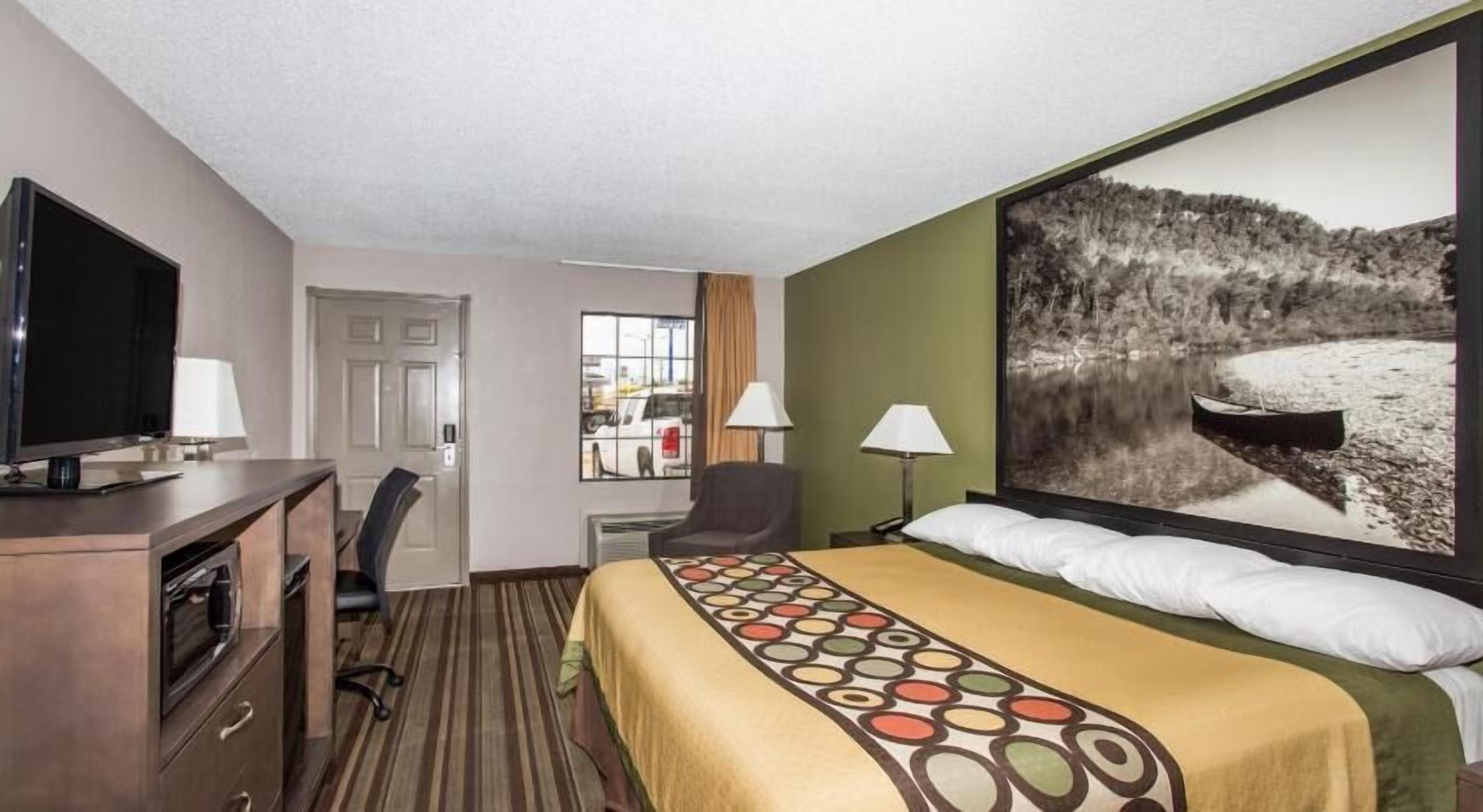 Desk, laptop workspace, blackout curtains, iron/ironing board
