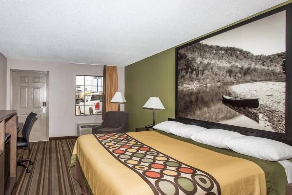 Desk, laptop workspace, blackout curtains, iron/ironing board