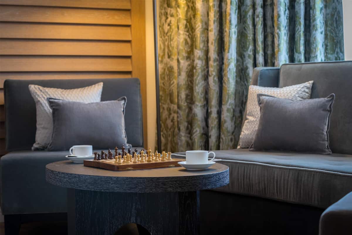 Junior Suite, 1 King Bed | Living area | IPod dock