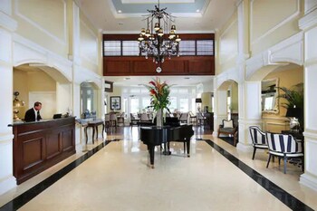 Sitting area in hotel lobby at Inn at Pelican Bay