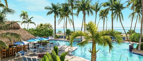 Outdoor pool, pool umbrellas, sun loungers