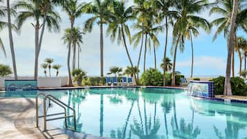 Outdoor pool, pool umbrellas, sun loungers