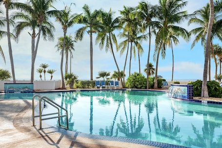 Outdoor pool, pool umbrellas, sun loungers