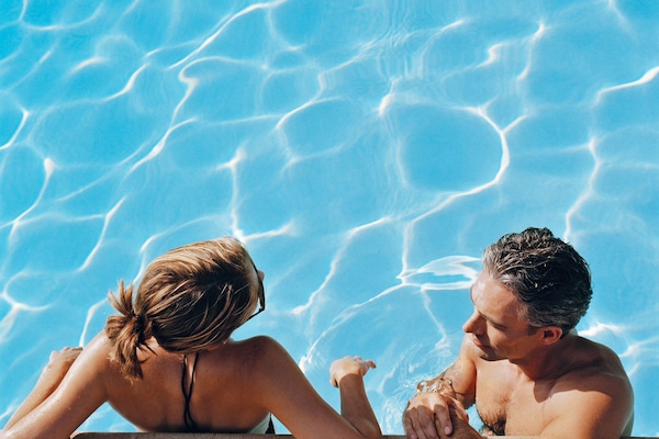 Outdoor pool, open 8:00 AM to 10:00 PM, pool umbrellas