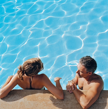 Outdoor pool, open 8:00 AM to 10:00 PM, pool umbrellas