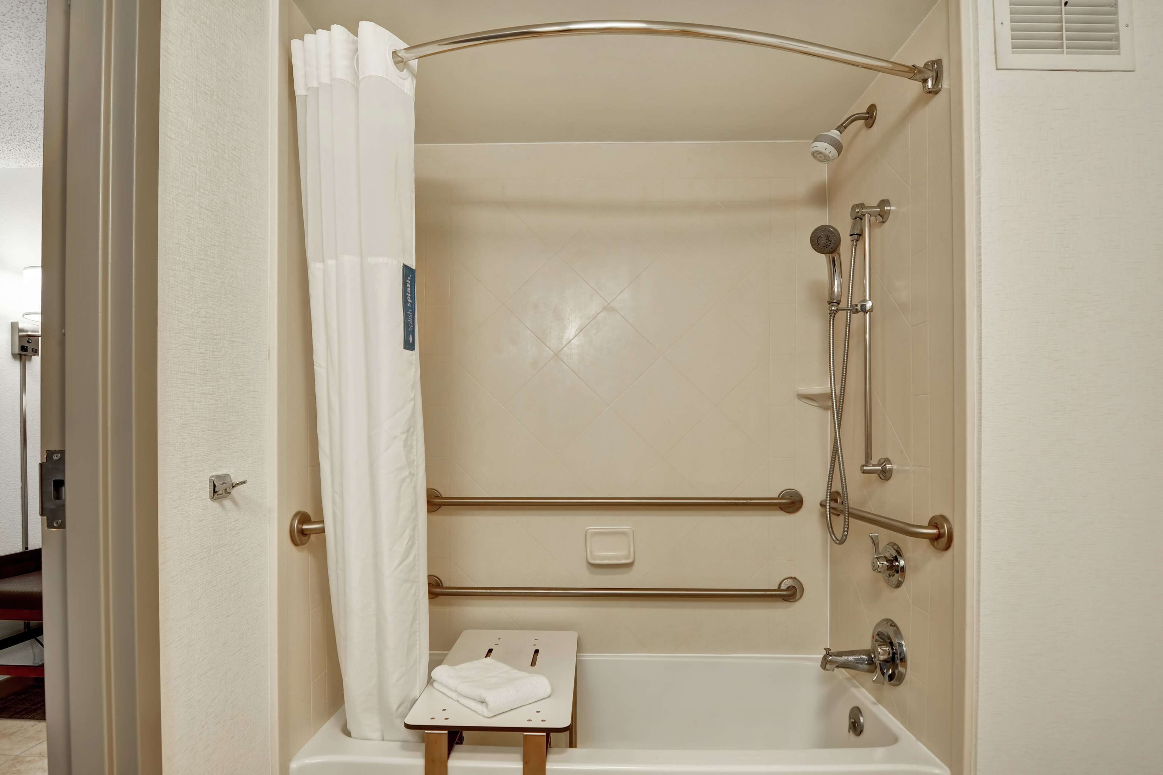 combined shower/bathtub, free toiletries, hair dryer, towels