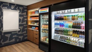A vending machine area with snacks, drinks, and a refrigerated section. - Residence Inn by Marriott Palo Alto Mountain View (Mountain View)