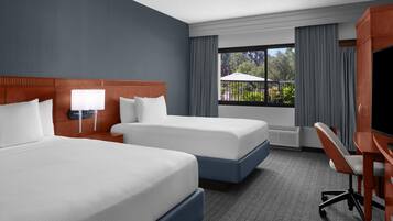 Premium bedding, down comforters, in-room safe, desk