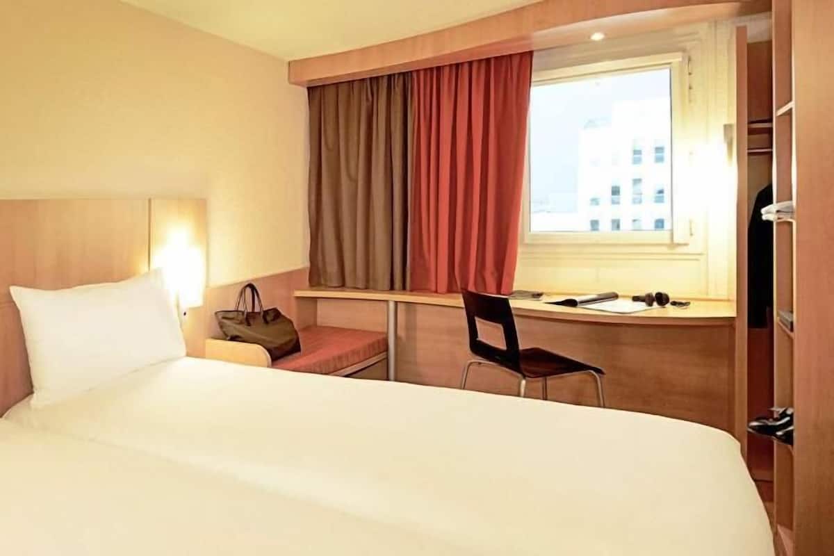 Desk, laptop workspace, blackout curtains, soundproofing