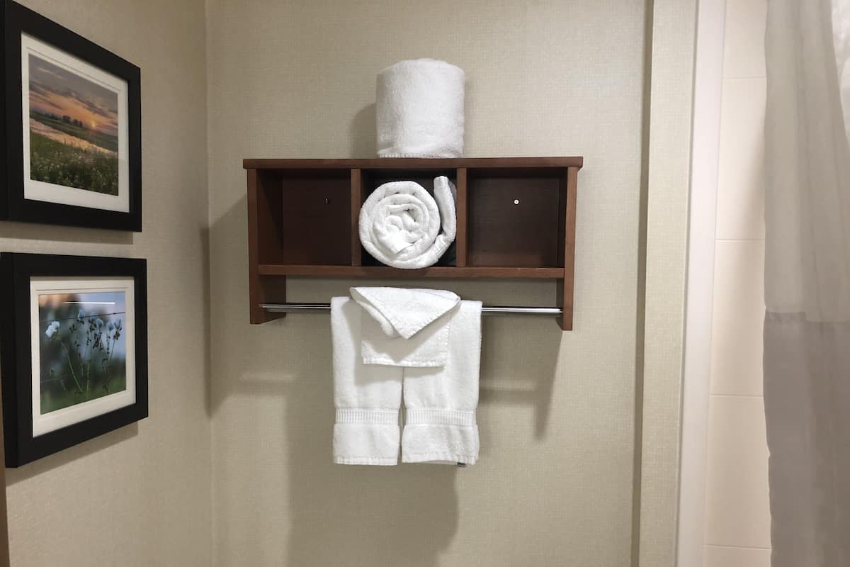 bathtub, free toiletries, hair dryer, towels