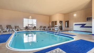 Indoor pool, open 8:00 AM to 10:00 PM, pool loungers