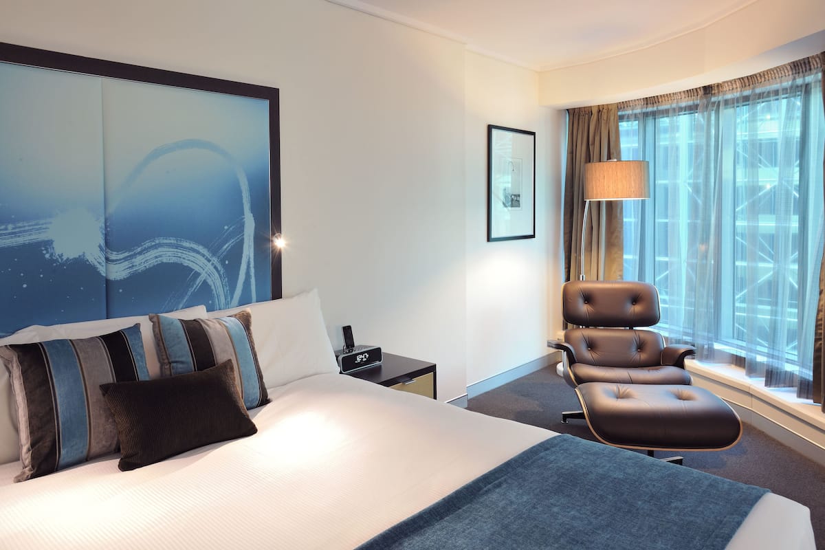 Junior Suite, 1 King Bed | 1 bedroom, down comforters, in-room safe, desk