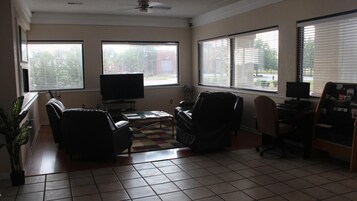 40-inch flat-screen TV with satellite channels, TV