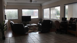 40-inch flat-screen TV with satellite channels, TV
