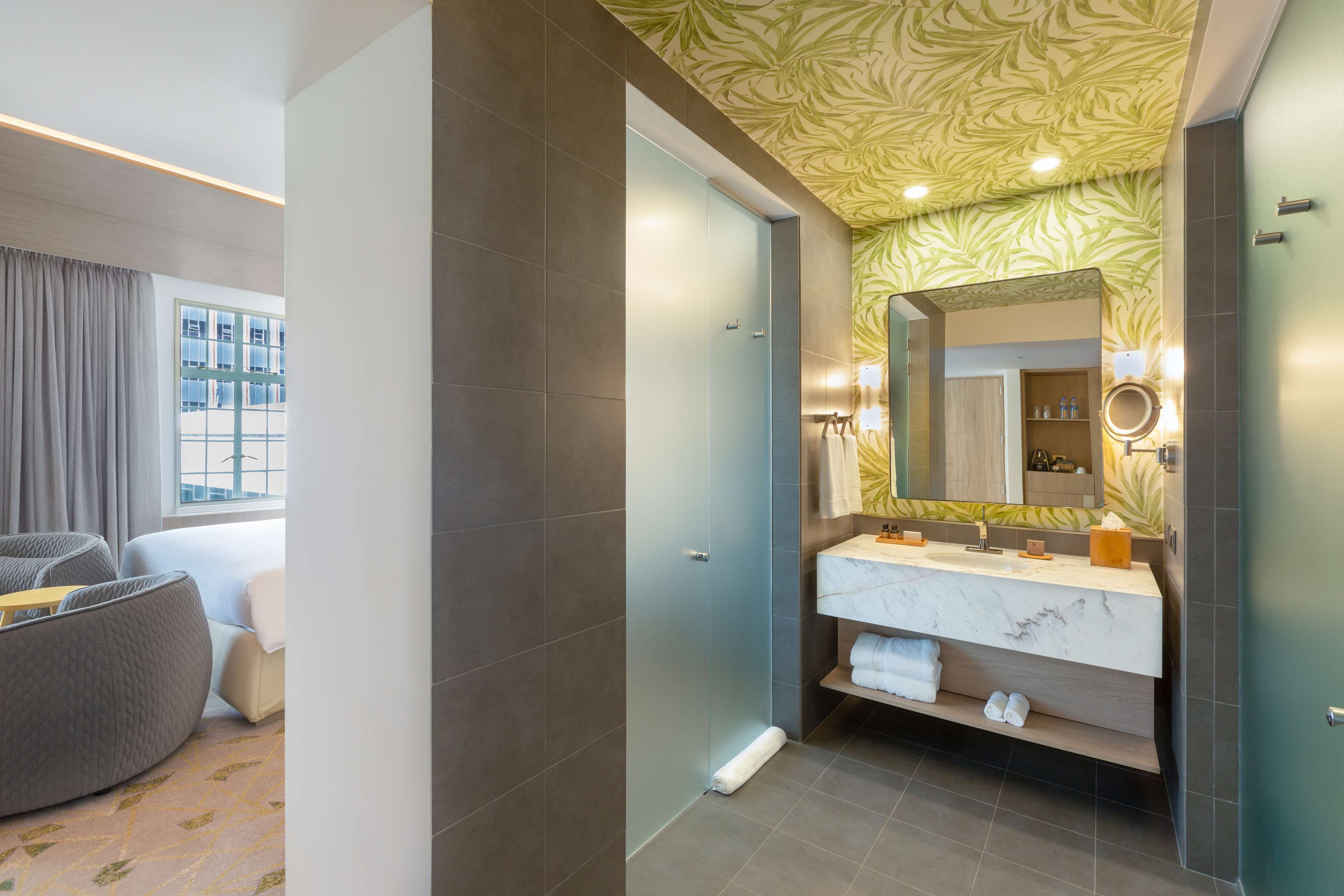 junior double or twin room, 1 king bed | bathroom | shower, free toiletries, hair dryer, towels