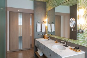 A modern bathroom with two sinks, a large mirror, and a wardrobe. - Gran Hotel Costa Rica, Curio Collection by Hilton (San José)