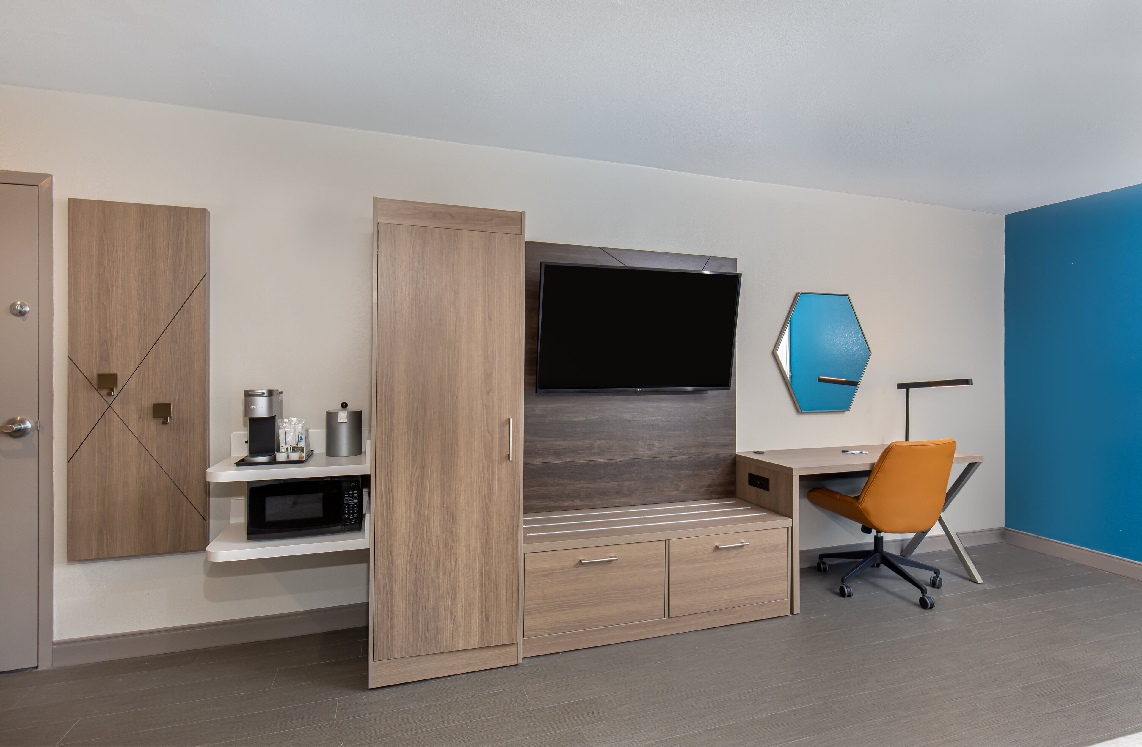 premium bedding, desk, laptop workspace, iron/ironing board